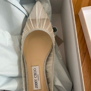 Jimmy Choo “love flat” shoes.